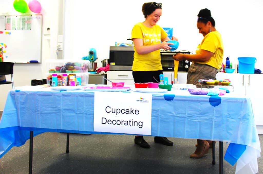 Cupcake decorating station at open day