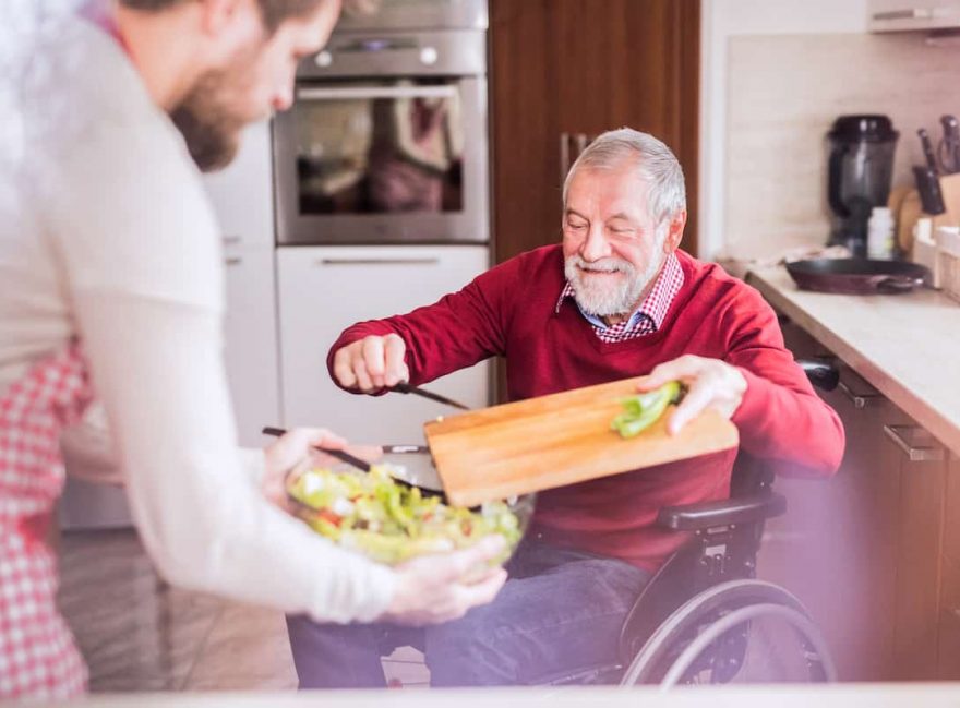 NDIS Plan Manager Helping Disabled Man Cook Food