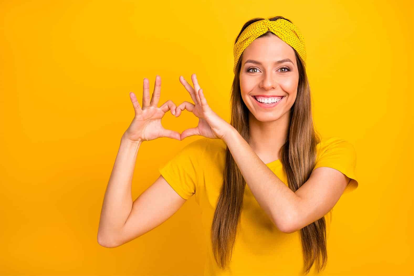 Lady Making Heart Form Using Her Hands