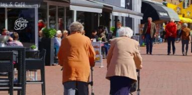 Two old lady walking — Disability Support Services in Robina, QLD